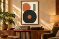 Amber Rotation artwork shown in a styled frame setting. Physical art print; frame and accessories not included.