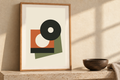 Sleeve and Shadow artwork shown in a styled frame setting. Physical art print; frame and accessories not included.