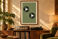 Two Spools artwork shown in a styled frame setting. Physical art print; frame and accessories not included.