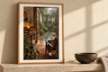 Garden Door Kissa artwork shown in a styled frame setting. Physical art print; frame and accessories not included.